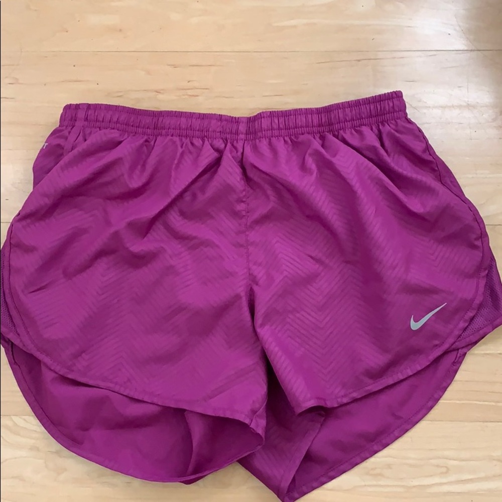 Purple Nike running shorts